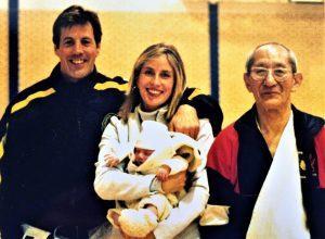 Photo of Jonathan, his wife and child, and Harada Sensei
